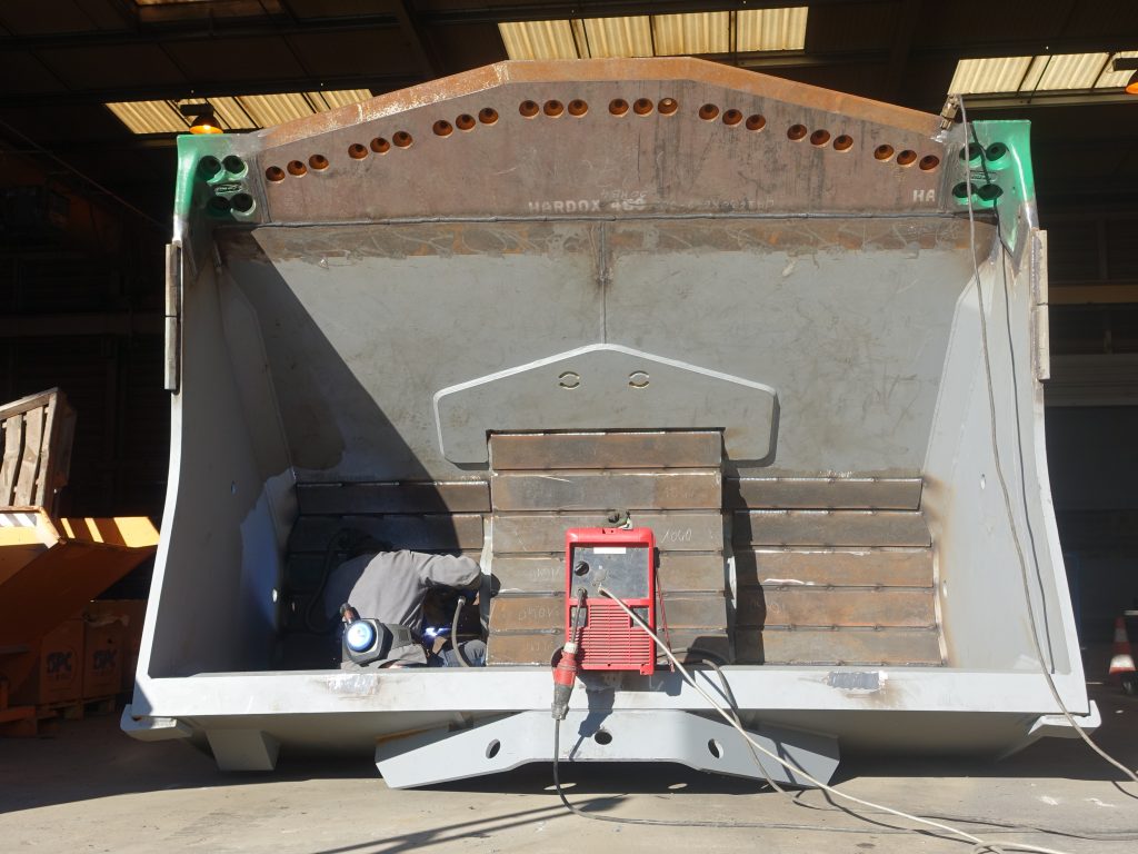 Welding work on a mining bucket